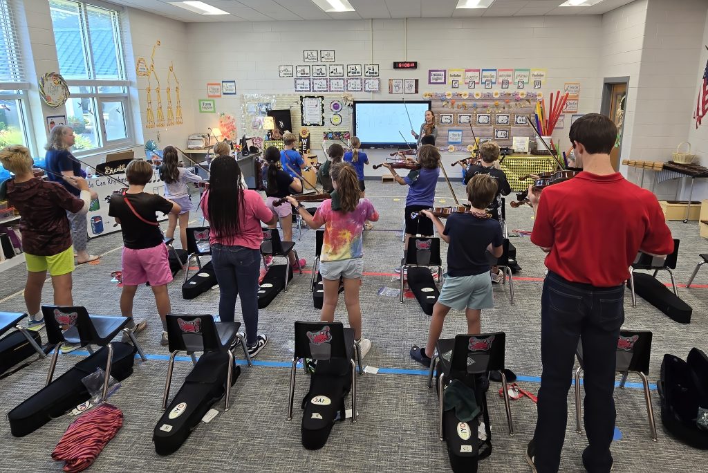 String-On! - a GIYO outreach program to introduce 5th grade students to playing a violin