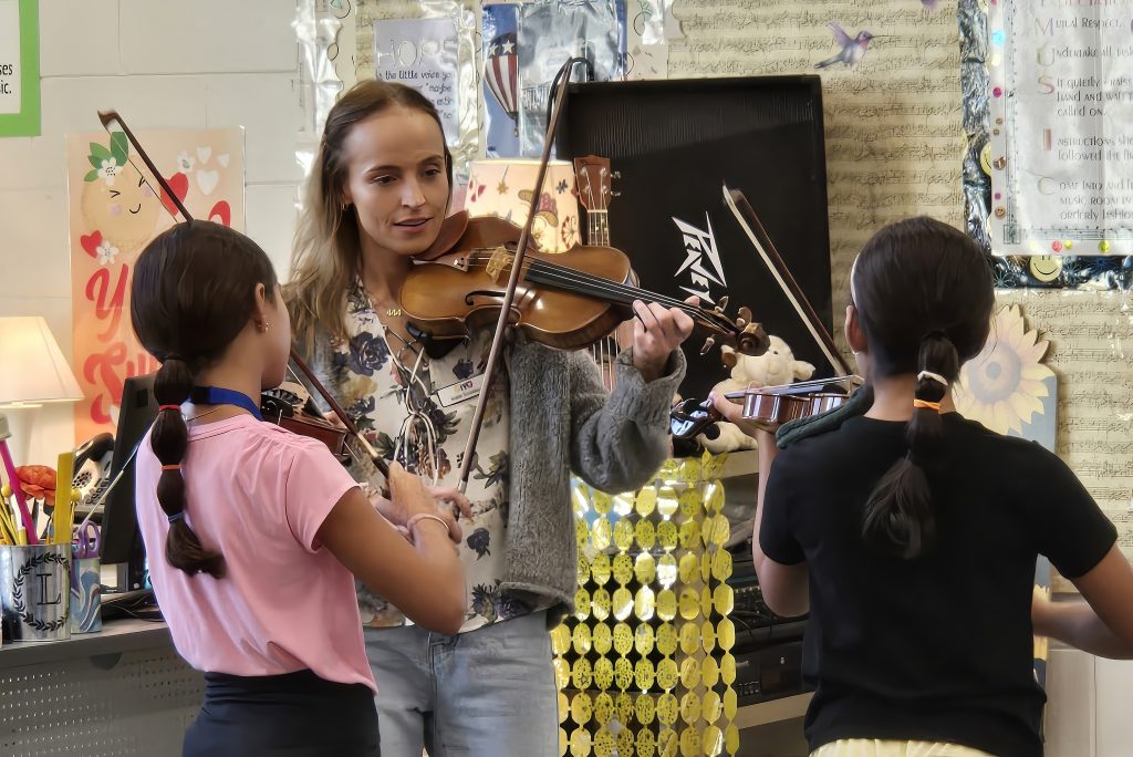 The GIYO String-On! outreach program introduces 5th graders to playing a violin
